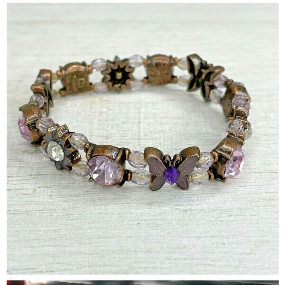 Avon copper tone purple butterfly stretchy bracelet